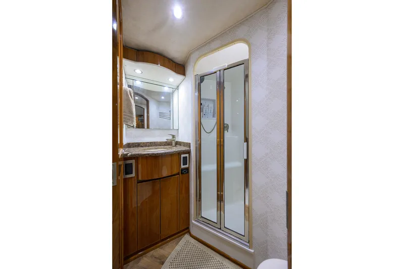 Slide: The Image of Luxurious bathroom interior of 2015 Viking 62 Convertible yacht with shower and vanity. - 36