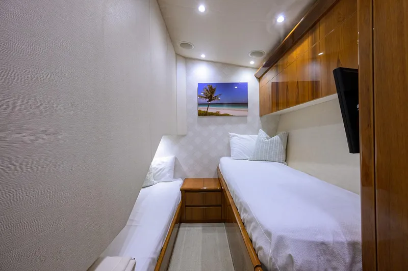 Slide: The Image of Cozy twin cabin interior of 2015 Viking 62 Convertible yacht with modern decor. - 53