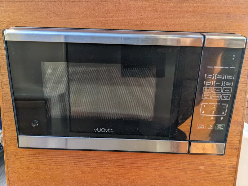 Slide: The Image of Microwave in Ranger Tugs R-27 boat, year 2021. - 23