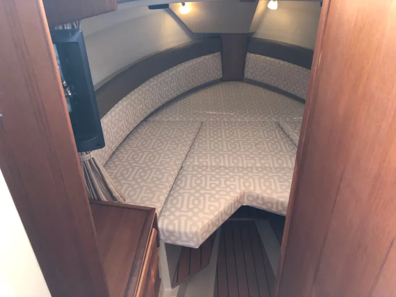 Slide: The Image of Interior of 2021 Ranger Tugs R-27 yacht cabin. - 9