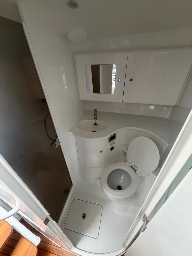 Slide: The Image of 2024 Intrepid Valor bathroom with toilet and sink. - 14