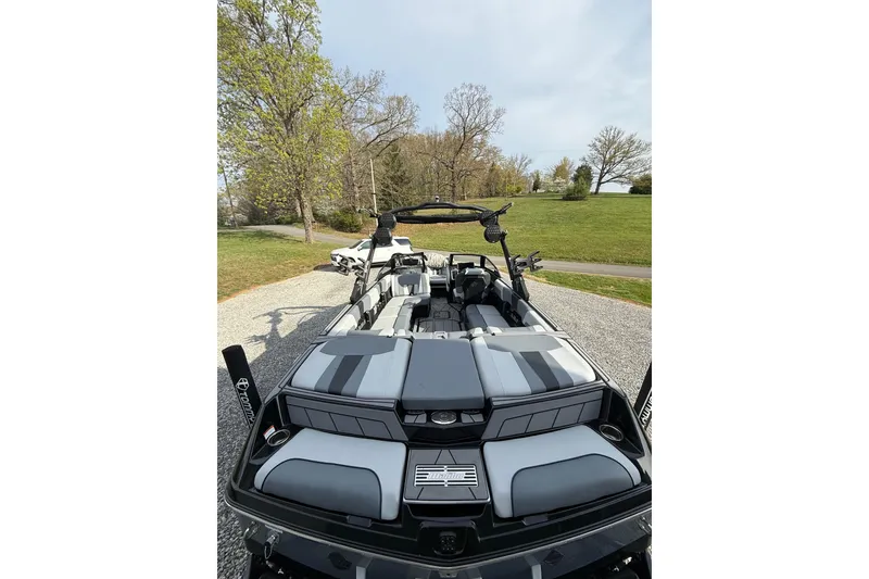 Slide: The Image of 2023 Malibu Wakesetter 23 LSV boat with sleek interior design on a sunny day. - 11