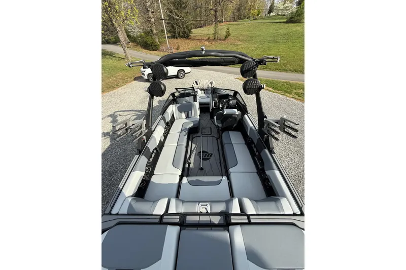 Slide: The Image of 2023 Malibu Wakesetter 23 LSV boat interior with sleek seating and advanced features. - 12