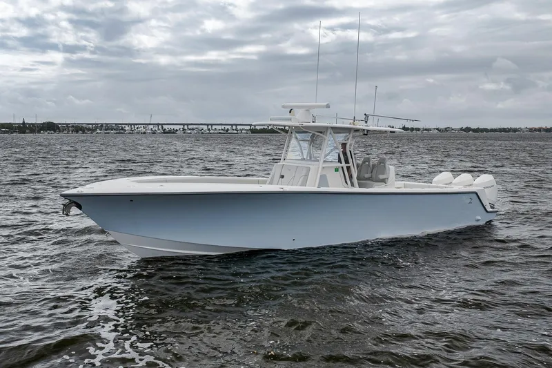 Slide: The Image of 2022 SeaVee 370Z boat on open water under cloudy skies. - 15