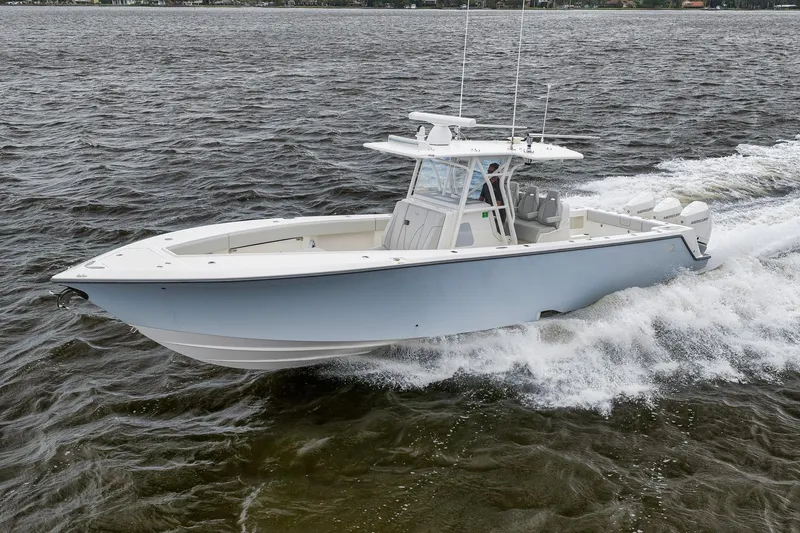 Slide: The Image of 2022 SeaVee 370Z boat cruising on open water, showcasing sleek design and powerful performance. - 28