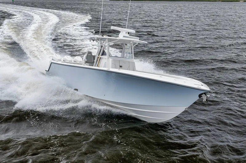 Slide: The Image of 2022 SeaVee 370Z boat cruising swiftly on open water. - 31