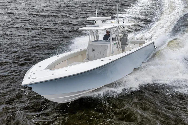 Slide: The Image of 2022 SeaVee 370Z boat cruising on water, showcasing sleek design and powerful performance. - 33