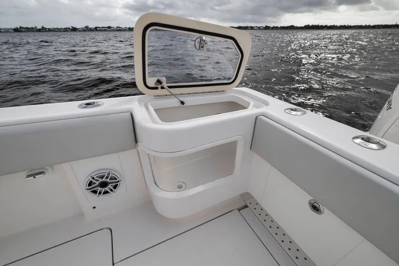 Slide: The Image of 2022 SeaVee 370Z boat interior with open hatch, ocean view, and sleek design. - 51