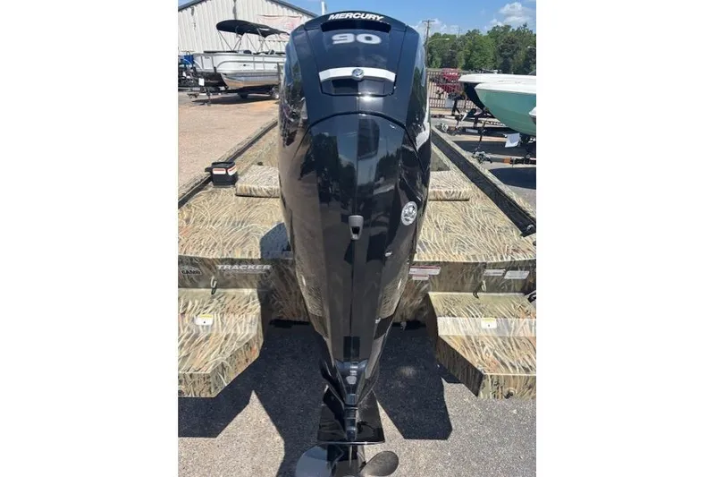 Slide: The Image of 2026 Tracker Grizzly 1860 CC boat with Mercury 90 outboard motor, camo design. - 3