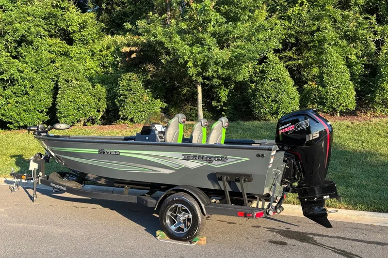 Slide: The Image of 2026 Ranger VS1782SC Angler boat with Mercury 115 engine, parked outdoors. - 5