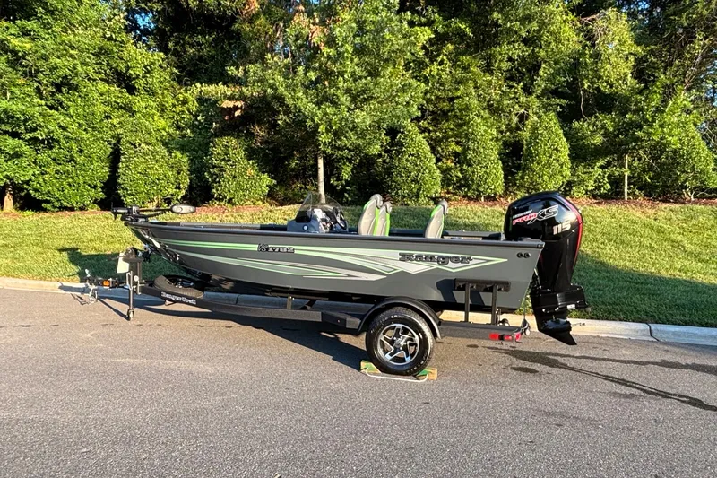 Slide: The Image of 2026 Ranger VS1782SC Angler boat on trailer, parked on a sunny street. - 4