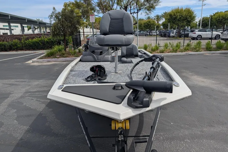 Slide: The Image of 2026 Tracker Pro 170 boat parked, featuring a sleek design and modern seating. - 69