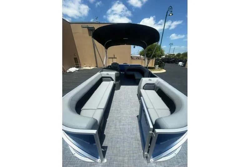 Slide: The Image of 2026 Sun Tracker Party Barge 18 DLX pontoon boat with spacious seating and canopy. - 4