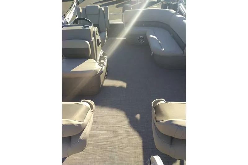Slide: The Image of Interior view of 2026 Sun Tracker Bass Buggy 16 XL Select pontoon boat with spacious seating. - 76