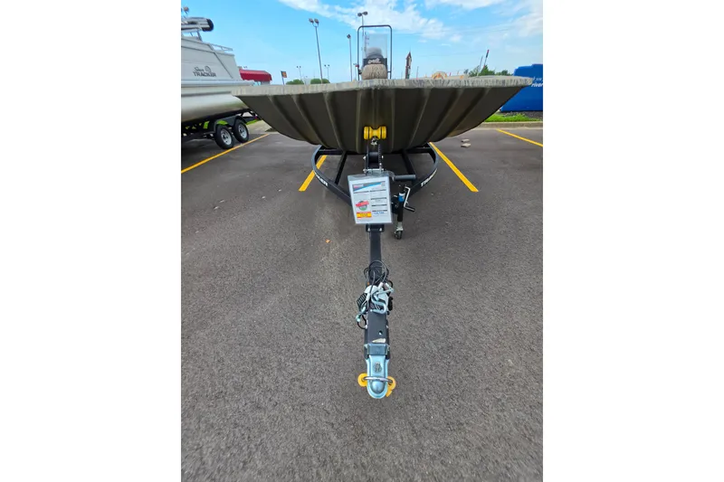 Slide: The Image of 2026 Tracker Grizzly 2072 CC boat on trailer in parking lot. - 7