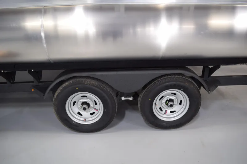 Slide: The Image of Trailer wheels of 2026 Sun Tracker Party Barge 20 DLX pontoon boat. - 19