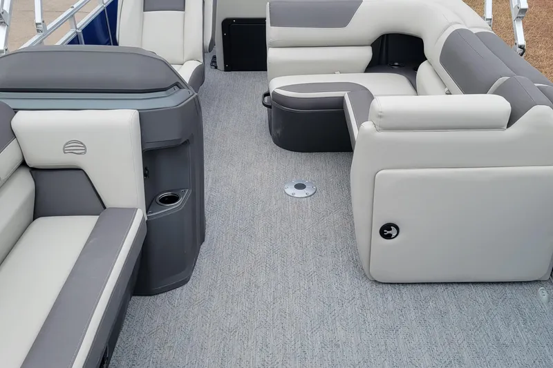 Slide: The Image of Interior of 2026 Sun Tracker Fishin' Barge 20 DLX with gray and white seating. - 100