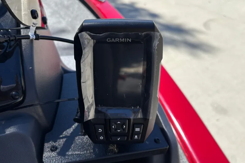 Slide: The Image of Garmin device on 2026 Tracker Super Guide V-16 SC boat dashboard, taped for protection. - 20