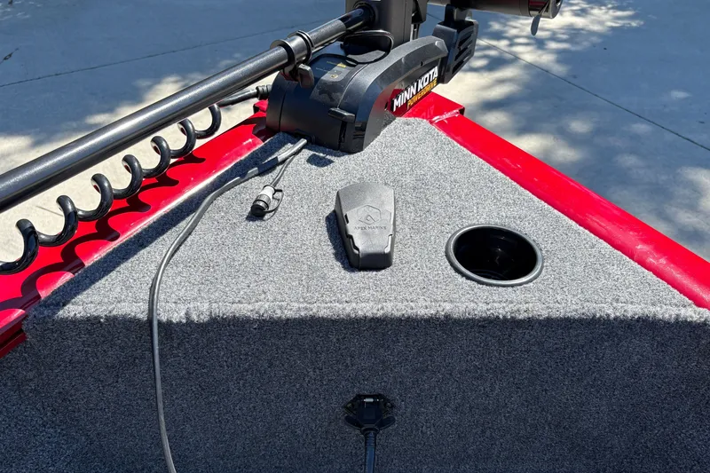 Slide: The Image of Front deck of 2026 Tracker Super Guide V-16 SC with Minn Kota trolling motor. - 17