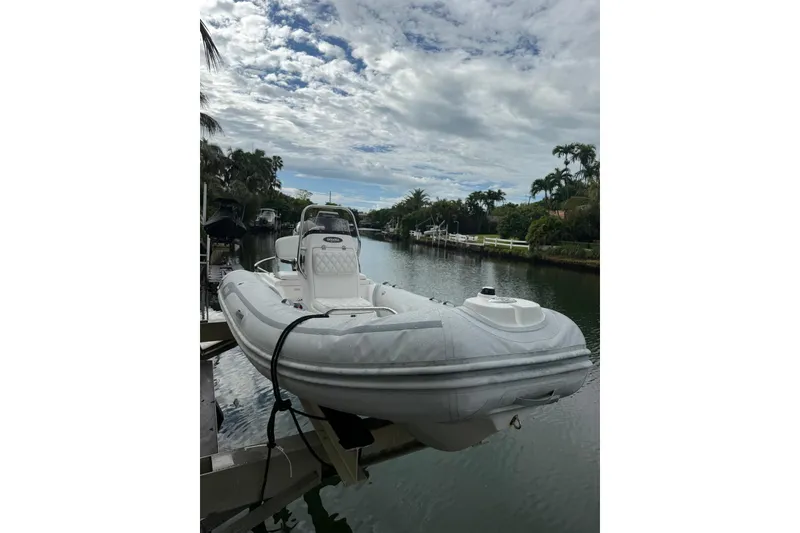 Slide: The Image of 2015 AB Inflatables Navigo 15 VS boat docked on a scenic canal. - 4