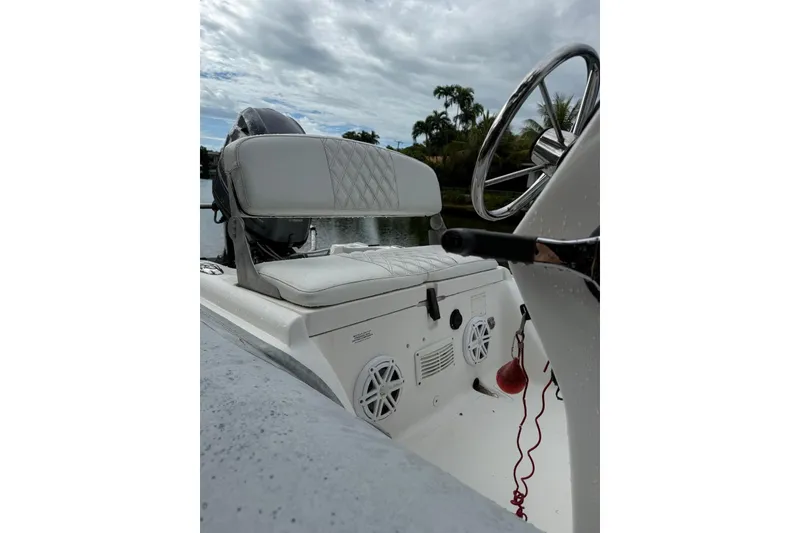 Slide: The Image of 2015 AB Inflatables Navigo 15 VS boat interior with steering wheel and seating. - 6