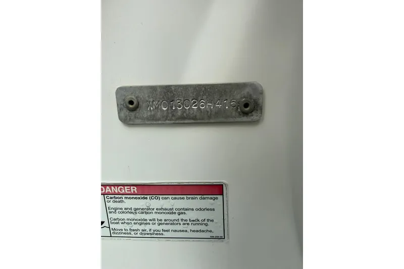 Slide: The Image of 2015 AB Inflatables Navigo 15 VS hull identification number and carbon monoxide warning label. - 9