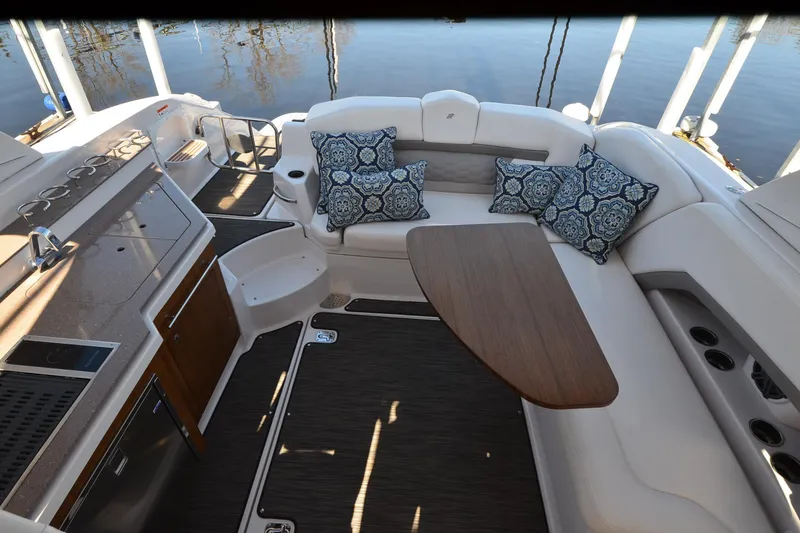 Slide: The Image of Luxurious 2018 Four Winns H350 boat interior with elegant seating and stylish cushions. - 16