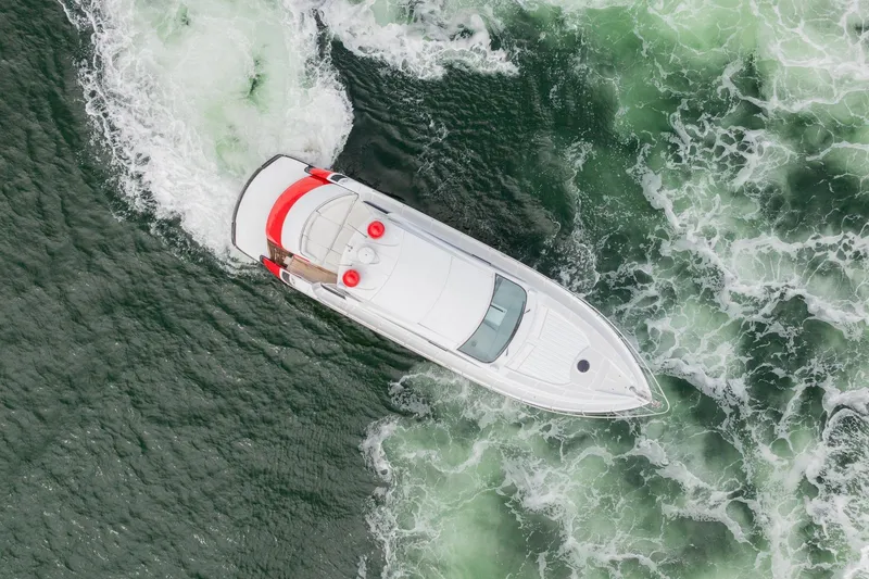 Slide: The Image of Aerial view of 2007 Pershing 56 yacht navigating through turbulent waters. - 41