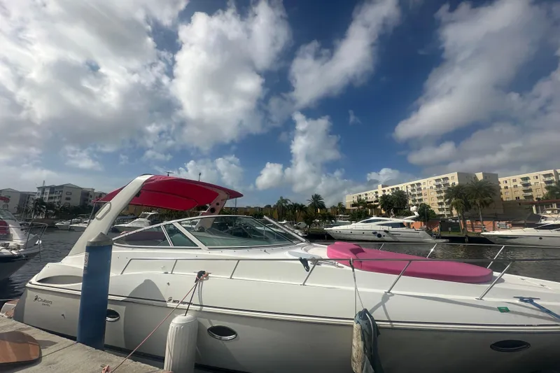 Slide: The Image of 2001 Sea Ray 340 Sundancer docked at marina under cloudy sky. - 20