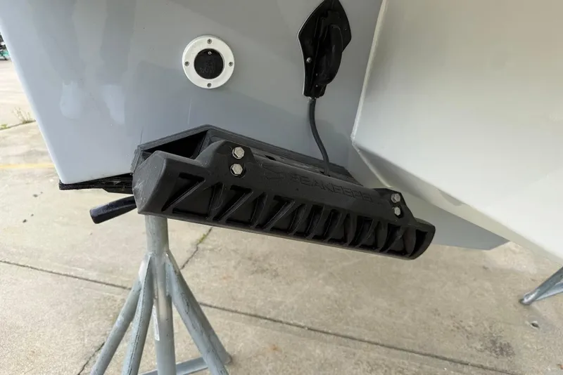 Slide: The Image of 2026 Steiger Craft 255 Miami boat hull with mounted transducer on stand. - 5