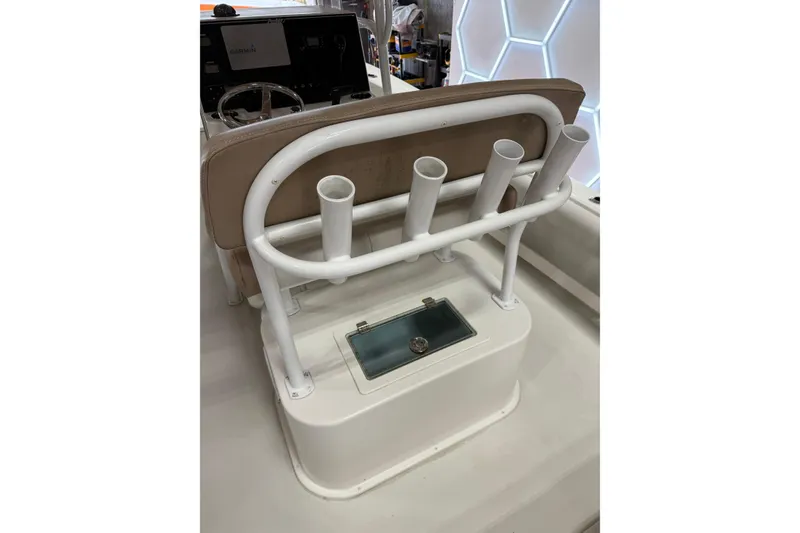 Slide: The Image of 2018 Parker 2100 SE boat interior with rod holders and Garmin display. - 12