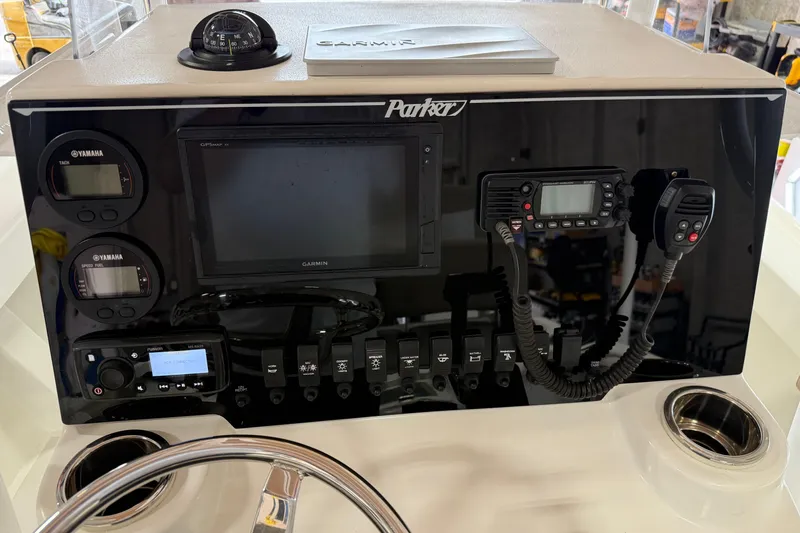 Slide: The Image of Control panel of a 2018 Parker 2100 SE boat with Garmin navigation system. - 18