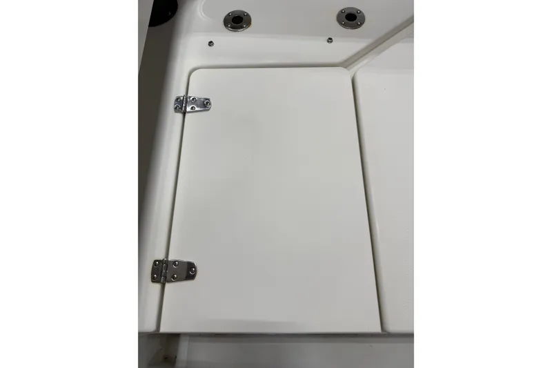 Slide: The Image of Hinged compartment door on a 2018 Parker 2100 SE boat. - 8