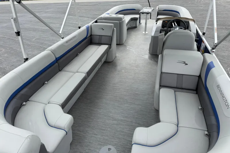 Slide: The Image of 2023 Bennington 25ssrc pontoon boat interior with spacious seating and modern design. - 17