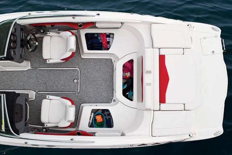 Slide: The Image of Manufacturer Provided Image: Top view of 2014 Chaparral 226 SSi boat interior with seating and storage. - 10