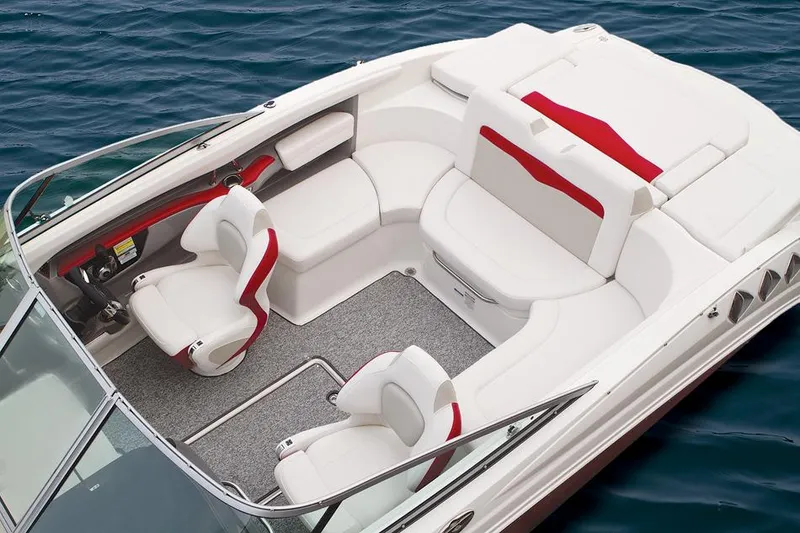 Slide: The Image of Manufacturer Provided Image: 2014 Chaparral 226 SSi boat interior with white and red seating on water. - 13