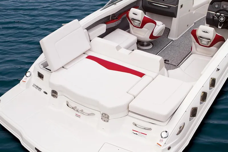 Slide: The Image of Manufacturer Provided Image: 2014 Chaparral 226 SSi boat interior with white and red seating. - 15