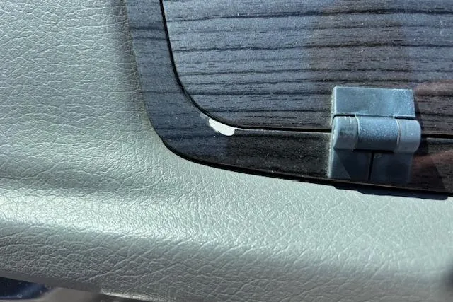Slide: The Image of Close-up of 2014 Chaparral 226 SSi interior detail with textured surface and hinge. - 29