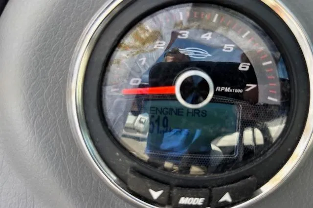 Slide: The Image of Close-up of a 2014 Chaparral 226 SSi tachometer showing 319 engine hours. - 35