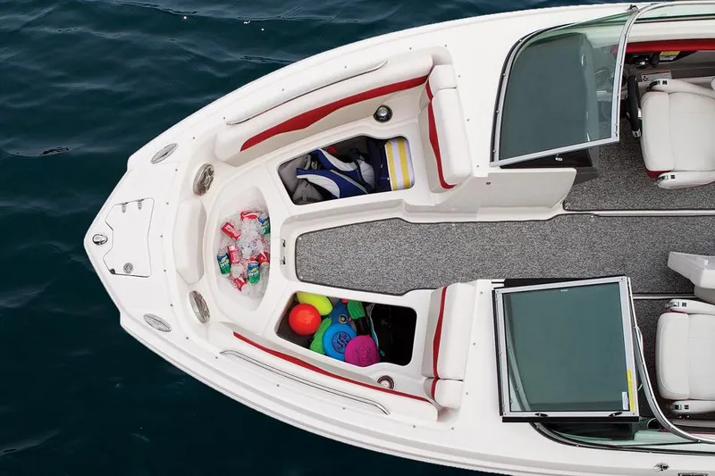 Slide: The Image of Manufacturer Provided Image: 2014 Chaparral 226 SSi boat with open bow seating and storage compartments. - 9