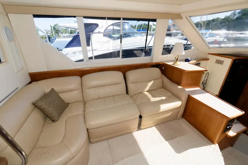 Slide: The Image of Interior of 1997 Carver 400 Cockpit Motor Yacht with leather sofa. - 20