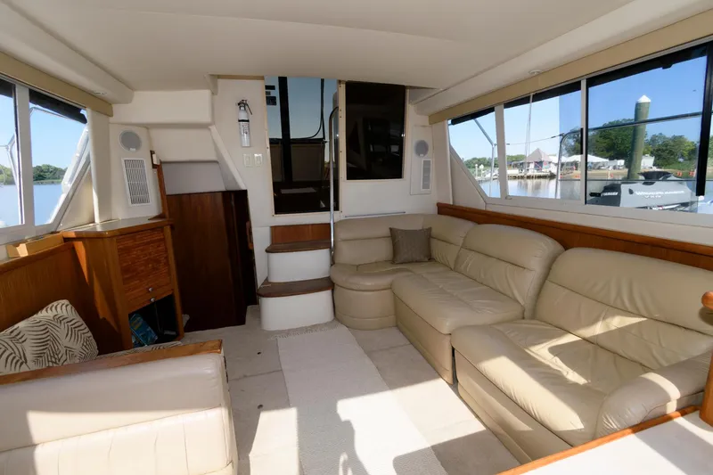 Slide: The Image of Interior of 1997 Carver 400 Cockpit Motor Yacht with leather sofa. - 24