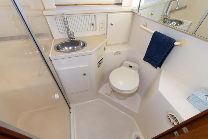 Slide: The Image of Interior view of 1997 Carver 400 Yacht bathroom. - 28