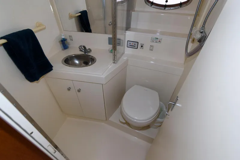Slide: The Image of Interior view of 1997 Carver 400 Yacht bathroom. - 30