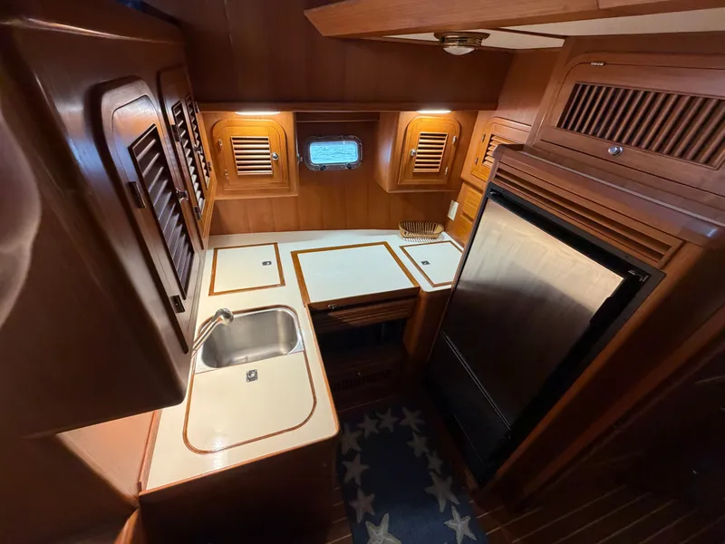 Slide: The Image of Interior view of 2002 Heritage East 36 Sundeck yacht kitchen. - 5
