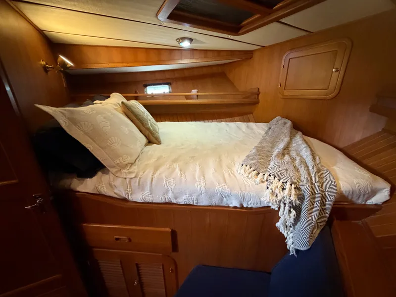 Slide: The Image of Interior of Heritage East 36 Sundeck yacht, cozy bedroom. - 8
