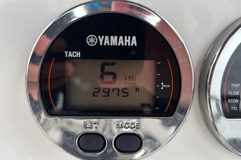 Slide: The Image of Yamaha tachometer displaying 2975 hours on a 2017 Robalo 246 Cayman boat. - 8