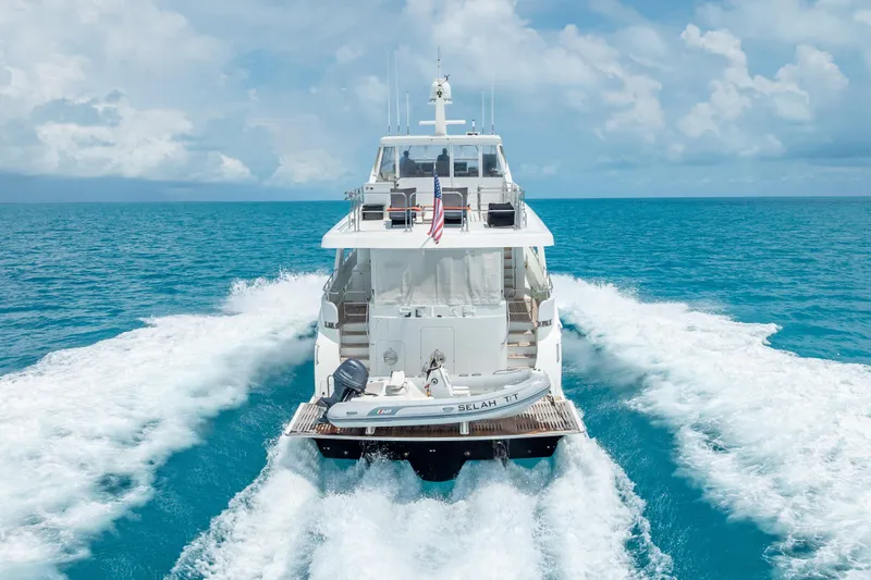 Slide: The Image of 2018 Cheoy Lee Bravo 78 Sport Motor Yacht cruising on turquoise ocean waters. - 11