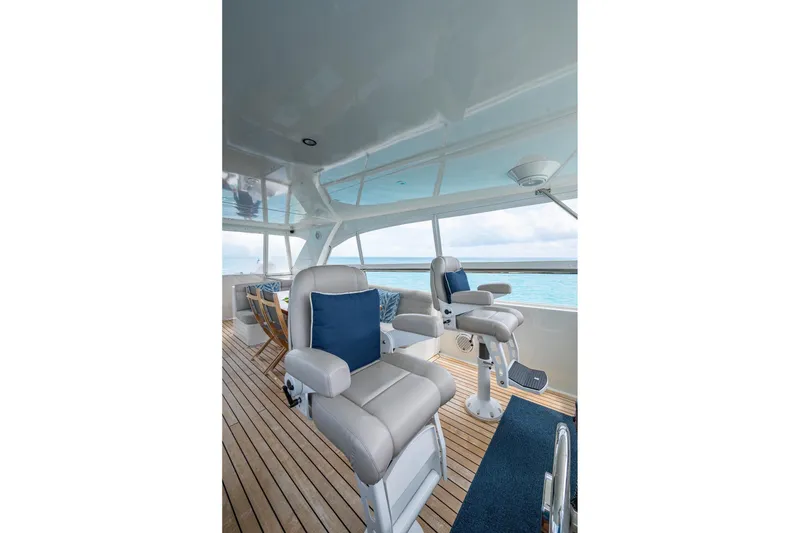 Slide: The Image of Luxurious interior of 2018 Cheoy Lee Bravo 78 Sport Motor Yacht with plush seating and ocean view. - 13