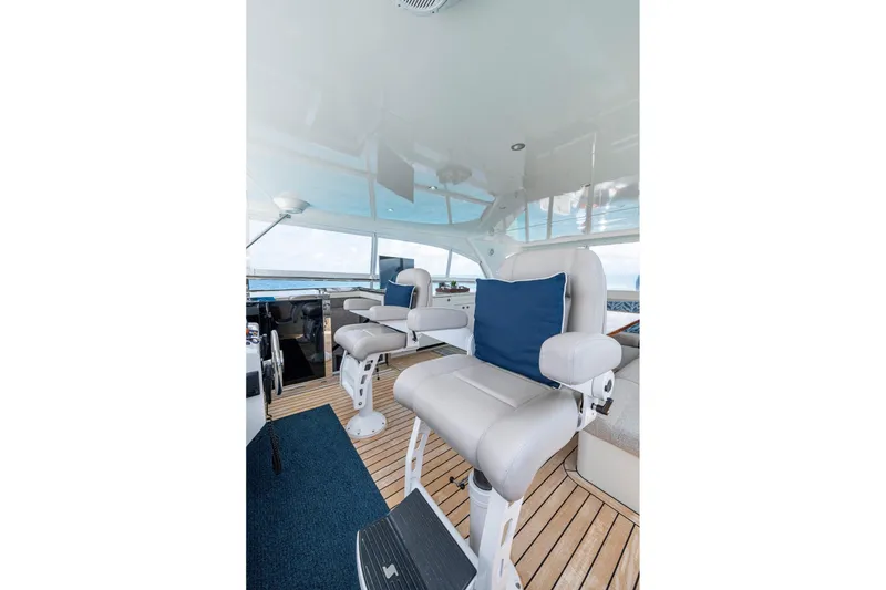 Slide: The Image of Interior of 2018 Cheoy Lee Bravo 78 Sport Motor Yacht with plush seating. - 15